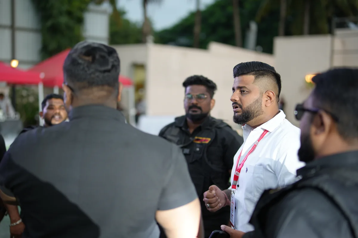 An outdoor discussion among supplied R CORPS personnel